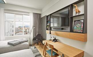 twin-room-desk-910x560.original.format-jpeg.jpg