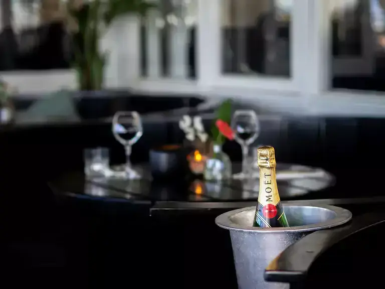 Chanpagne at a table