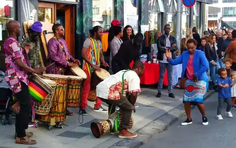 People playing African instruments