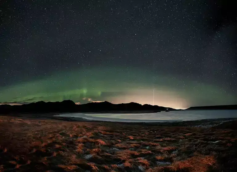 Kleifarvatn lake under northern lights