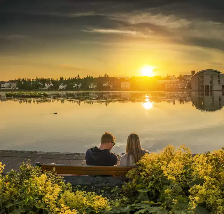 A couple during sunset at the Pond