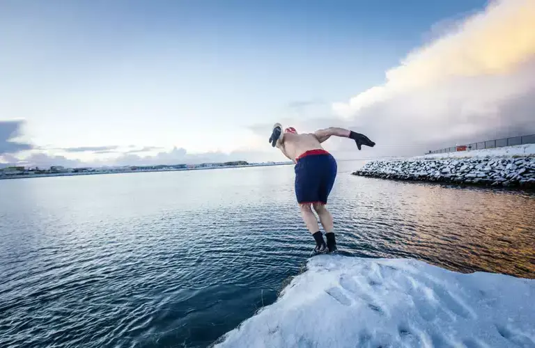 Man diving into the ocean