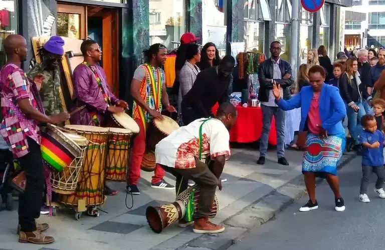 People playing African instruments