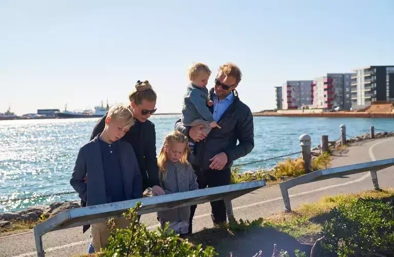 A family at the harbour in Hafnarfjörður