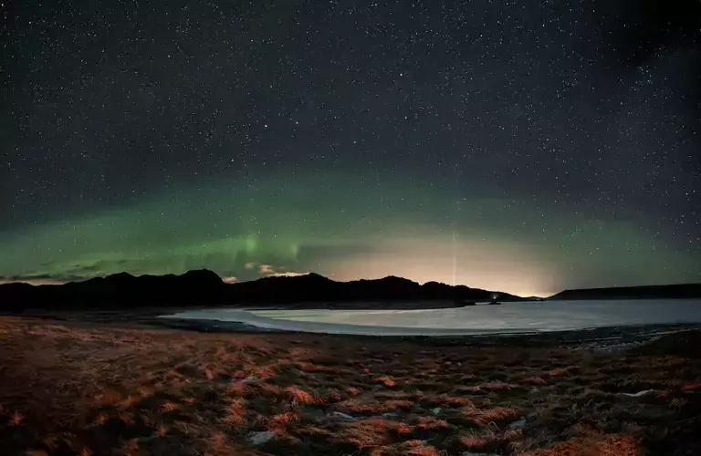 Kleifarvatn lake under northern lights